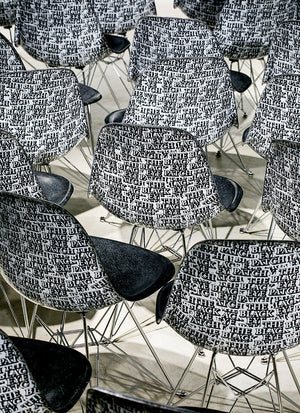 STICKER-COVERED CHAIR