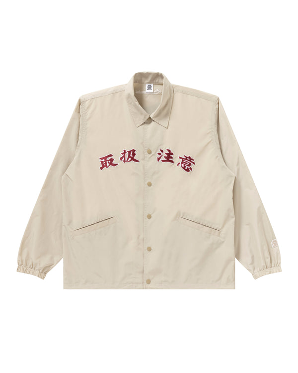 HANDLE WITH CARE COACH JACKET BEIGE