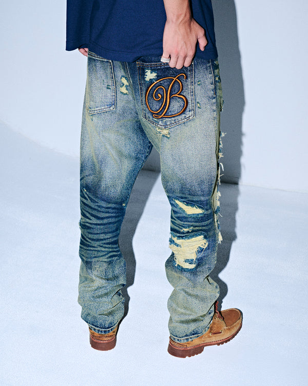 B EMBLEM DAMAGED SLIM JEANS INDIGO