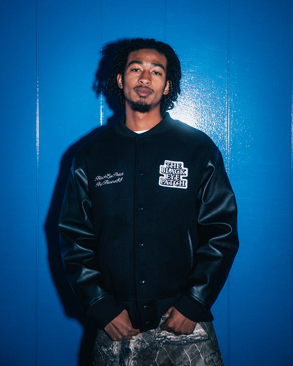 LABEL PACK PATCHED STADIUM JACKET BLACK