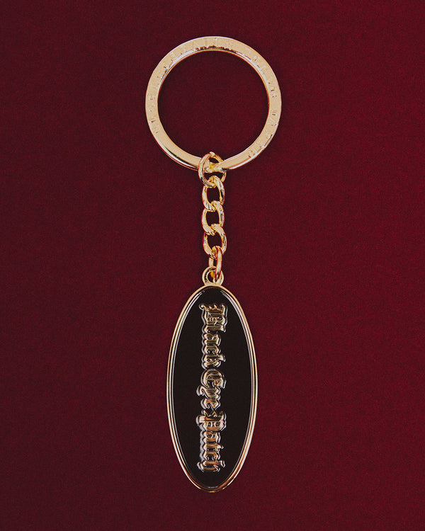 OE LOGO OVAL PLATE KEYCHAIN GOLD