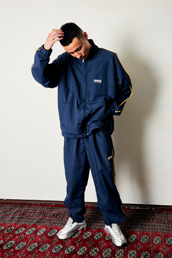 BEEZ-EYE-P Piping Track Pants, Navy